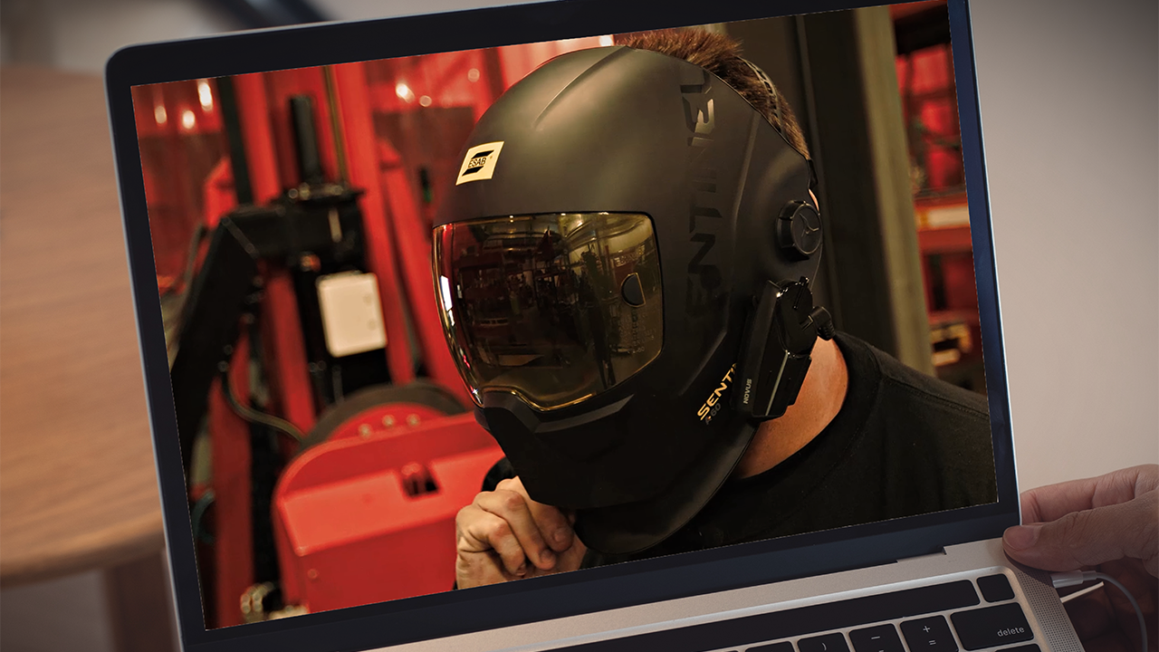 ALM VIKI OS video - screenshot from video of welder with welding helmet on