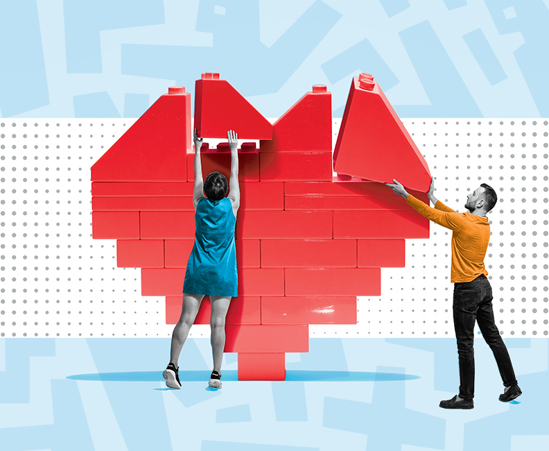 illustration of two people putting together an illustrated heart